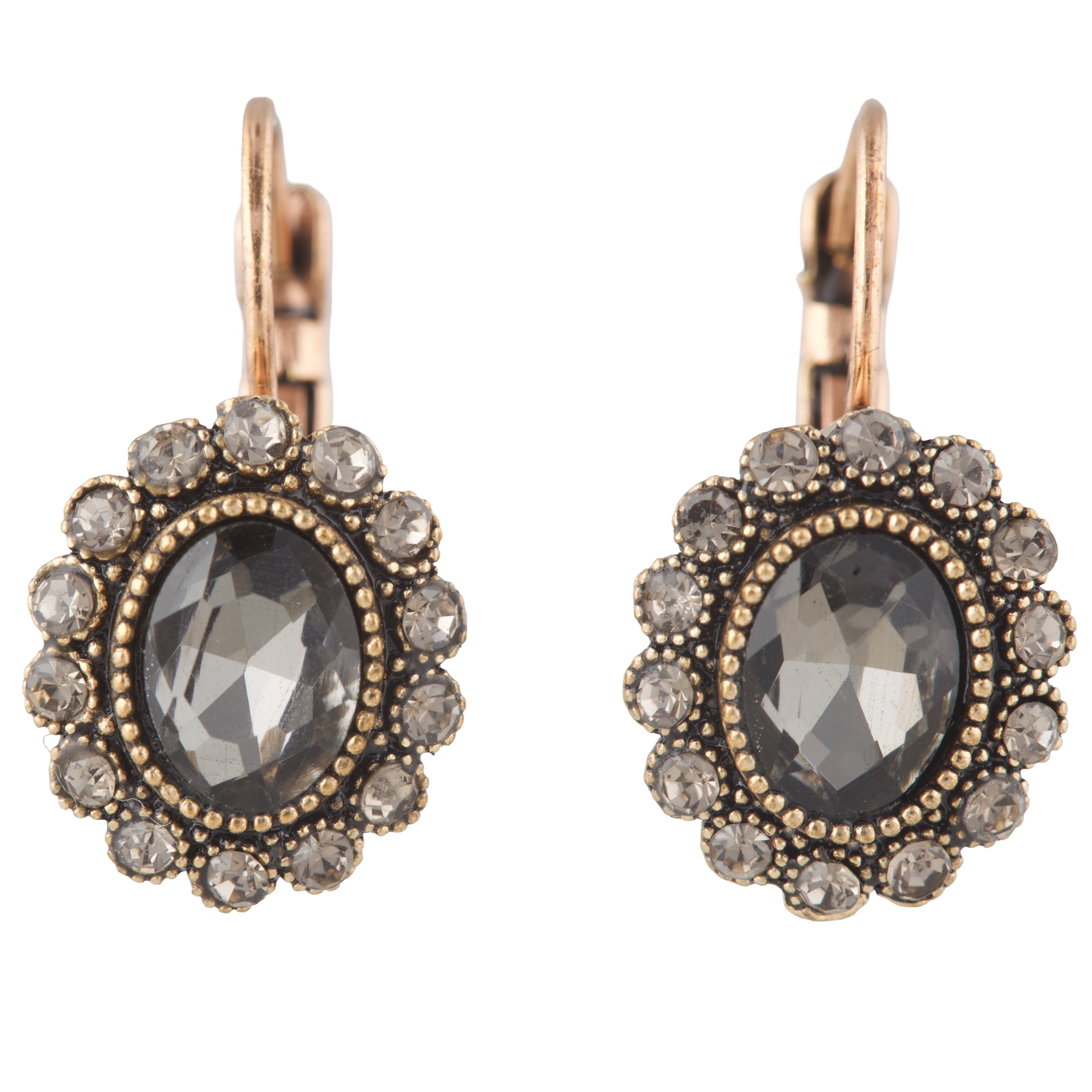 Pair of earrings with dark gemstones and gold accents on a white background