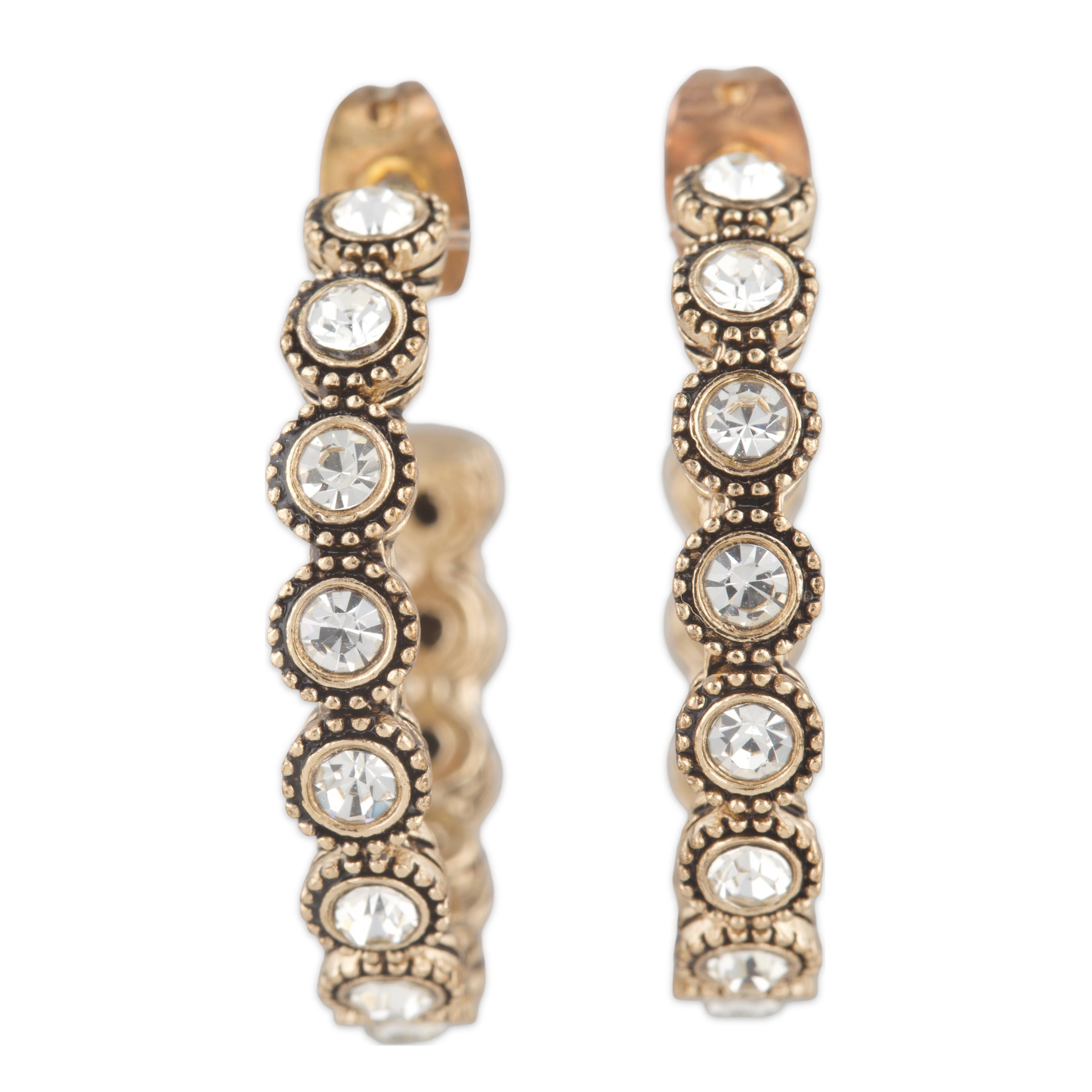 Pair of gold hoop earrings with embedded crystals on a white background