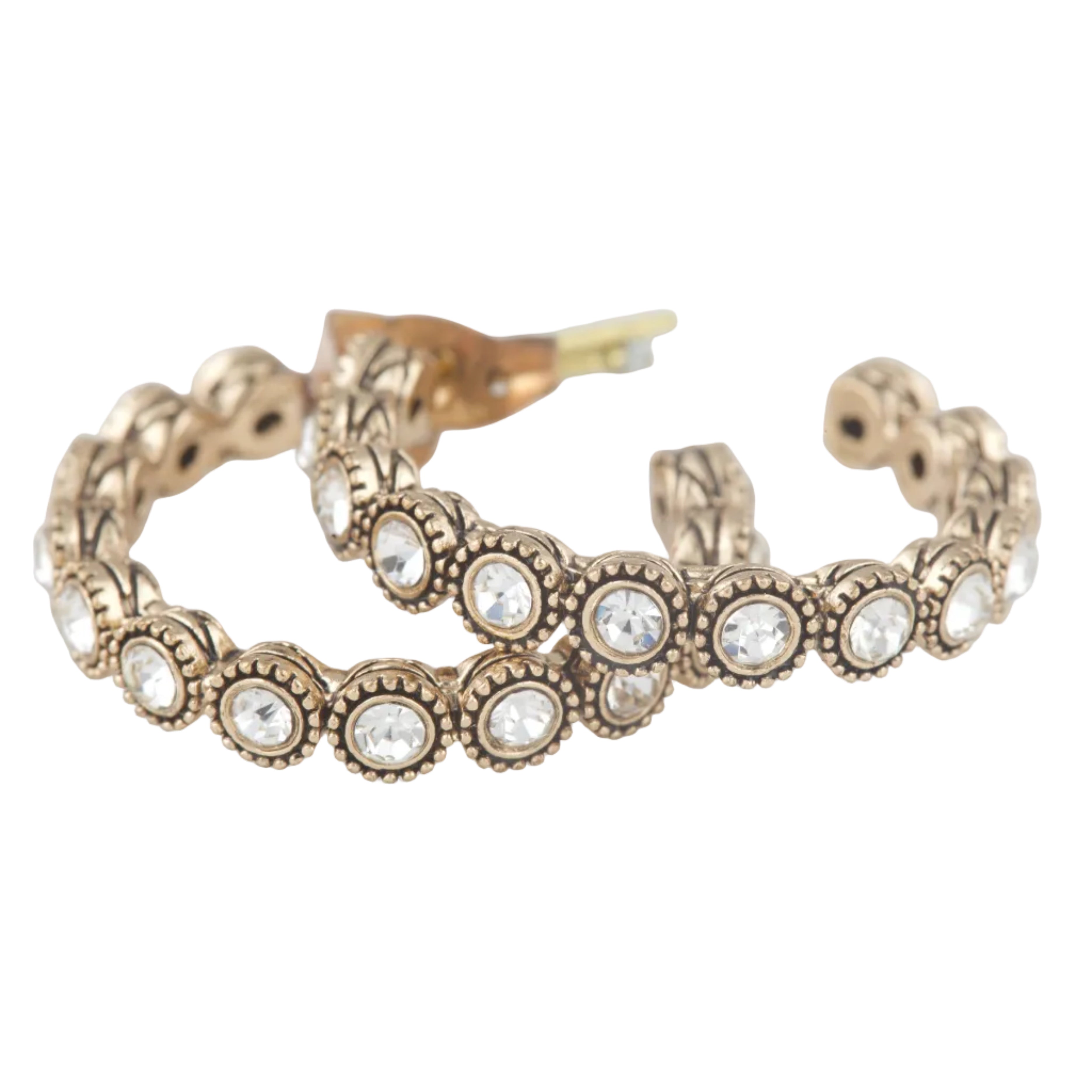 Gold hoop earring with embedded crystals on a white background