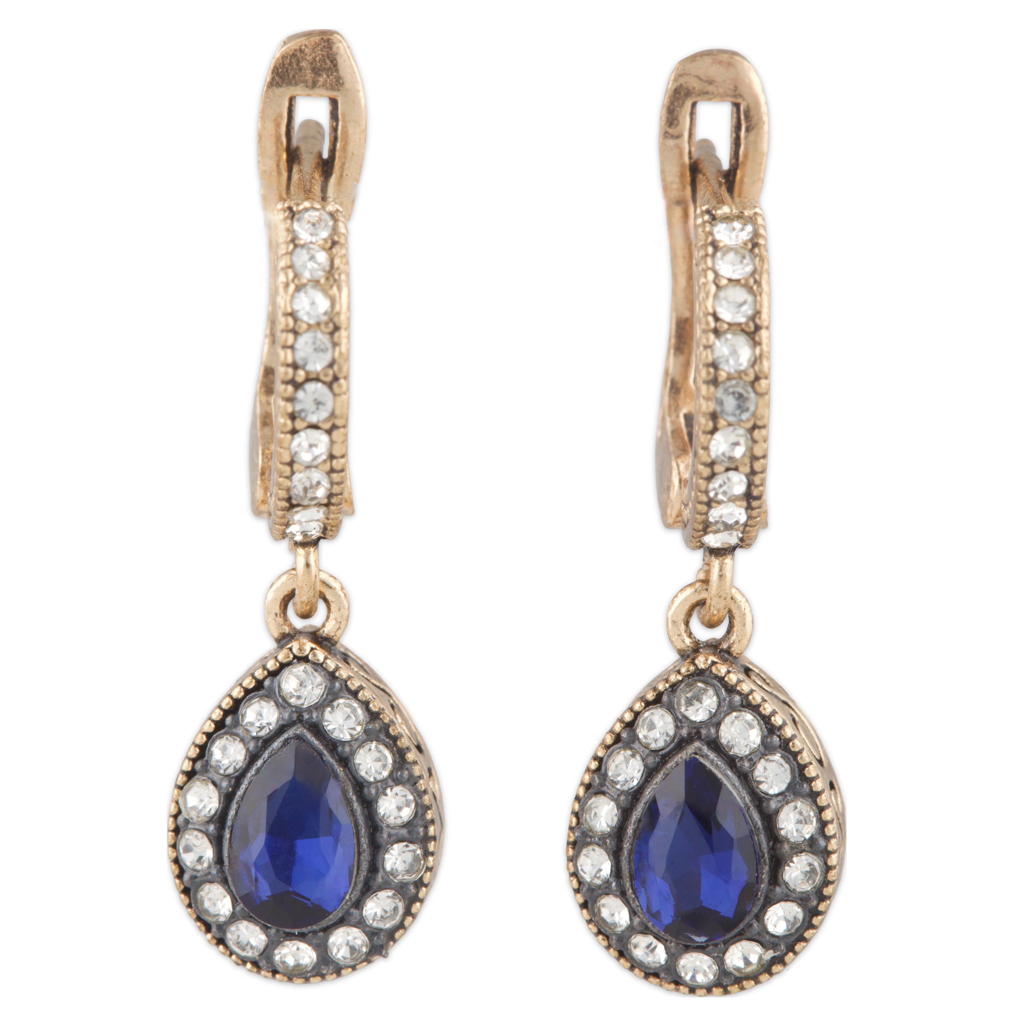 Pair of earrings with blue gemstones and gold accents on a white background
