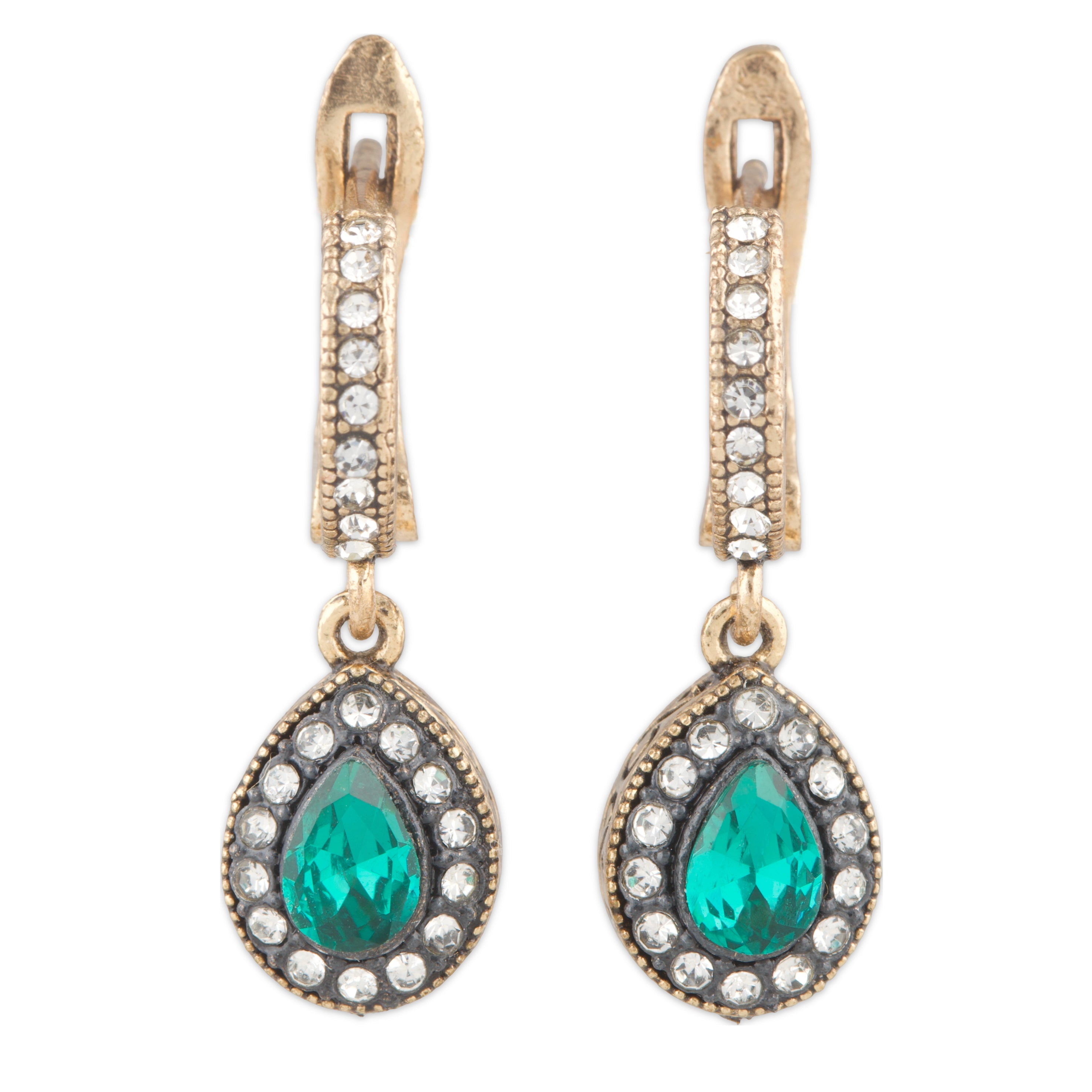 Pair of earrings with green teardrop stones and gold and silver accents on a white background