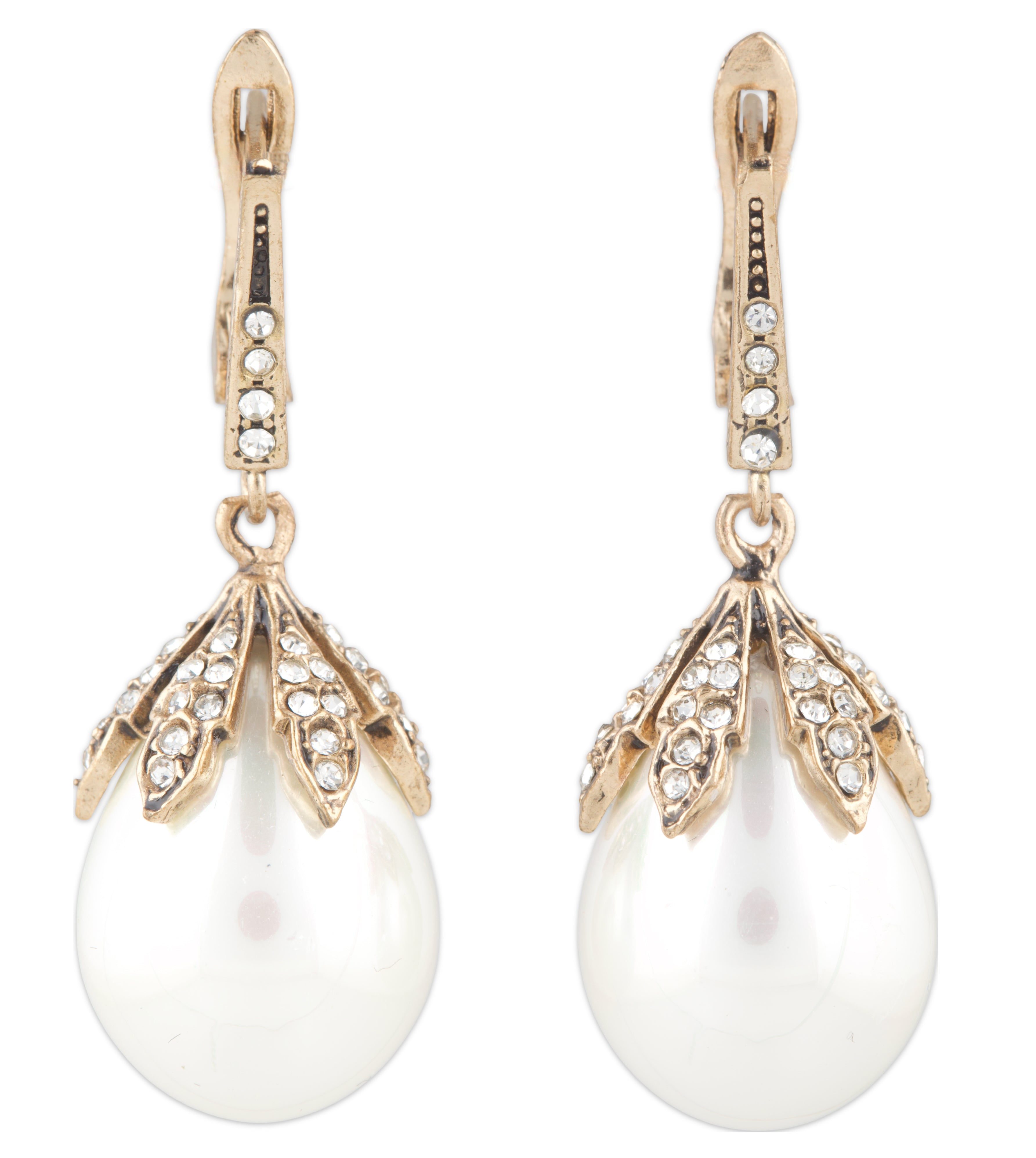 Pair of pearl earrings with gold and diamond accents on a white background