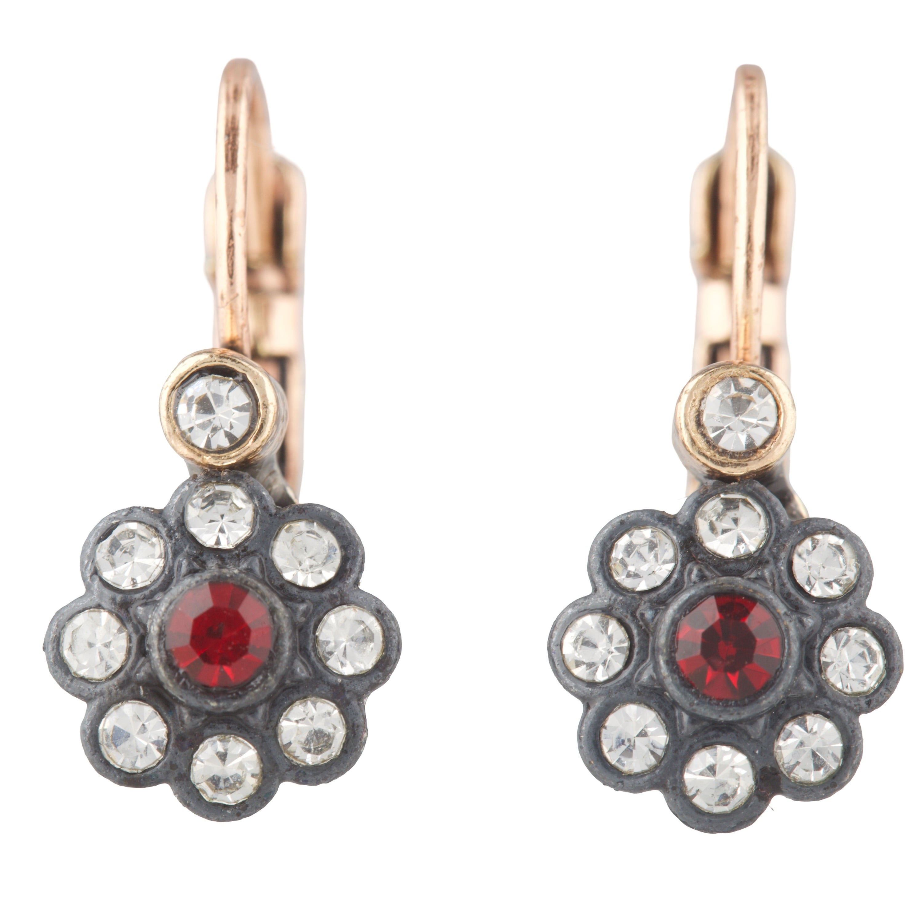 Pair of earrings with floral design and red gemstone on a white background