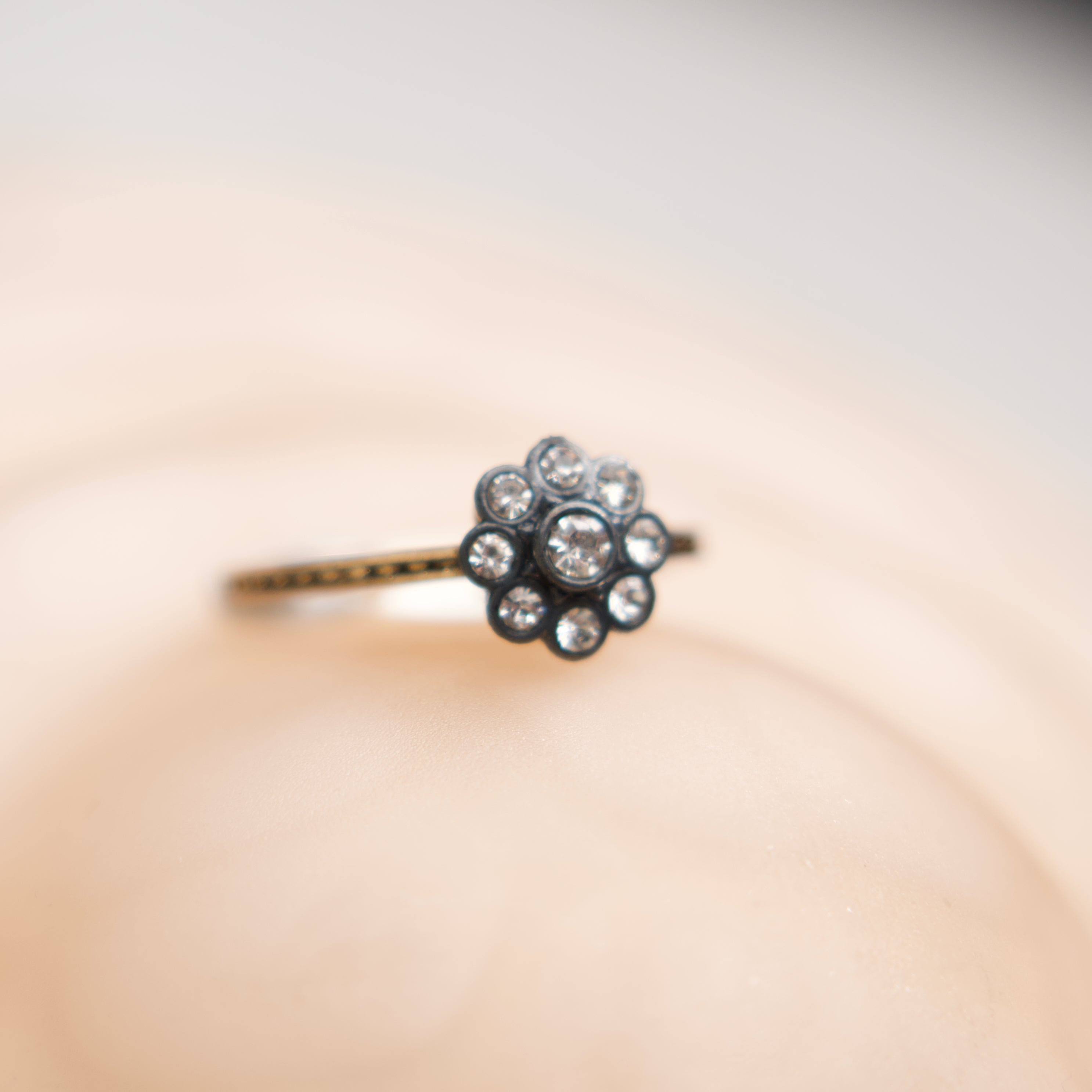 Floral diamond ring on a blurred background