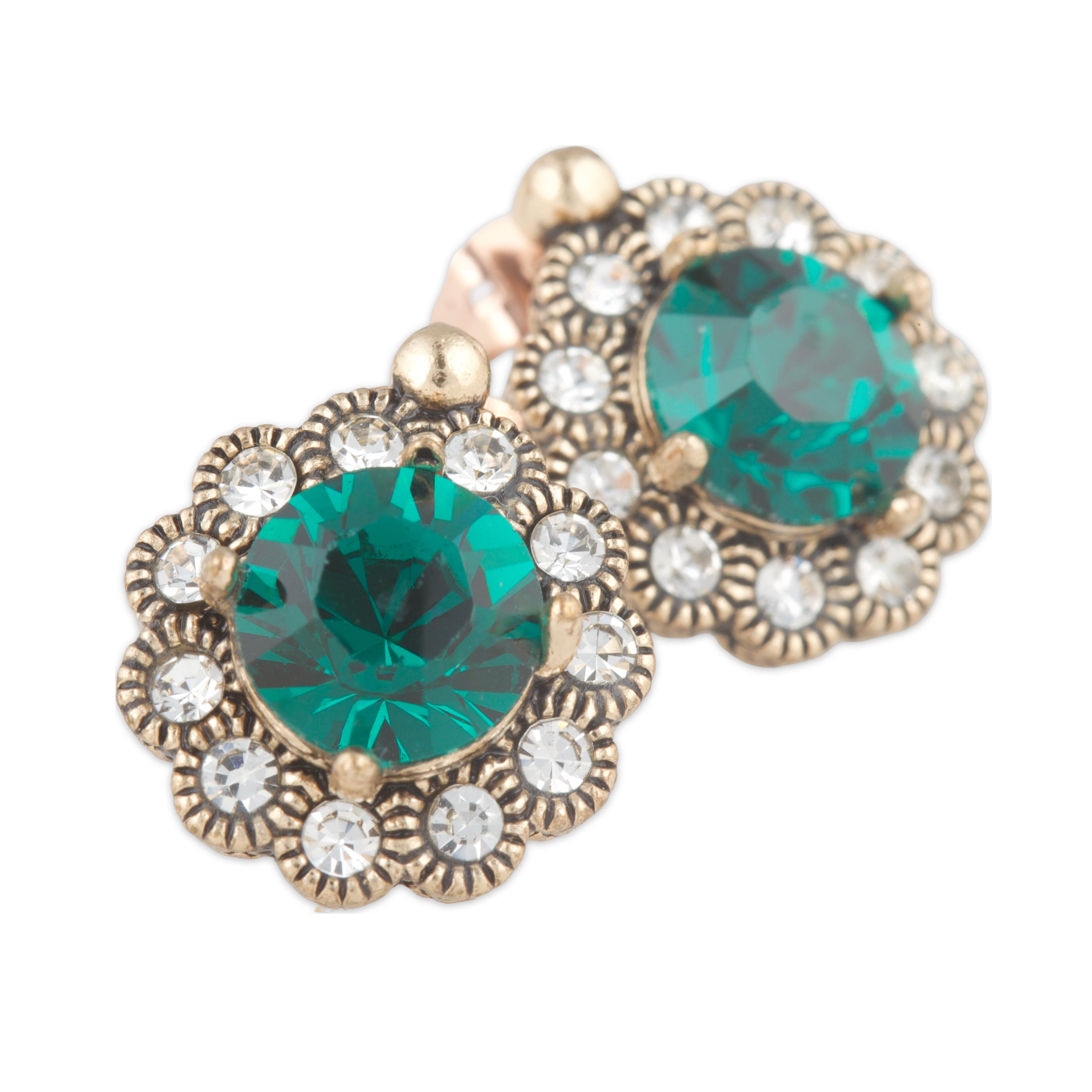 Pair of earrings with green gemstones and gold accents on a white background