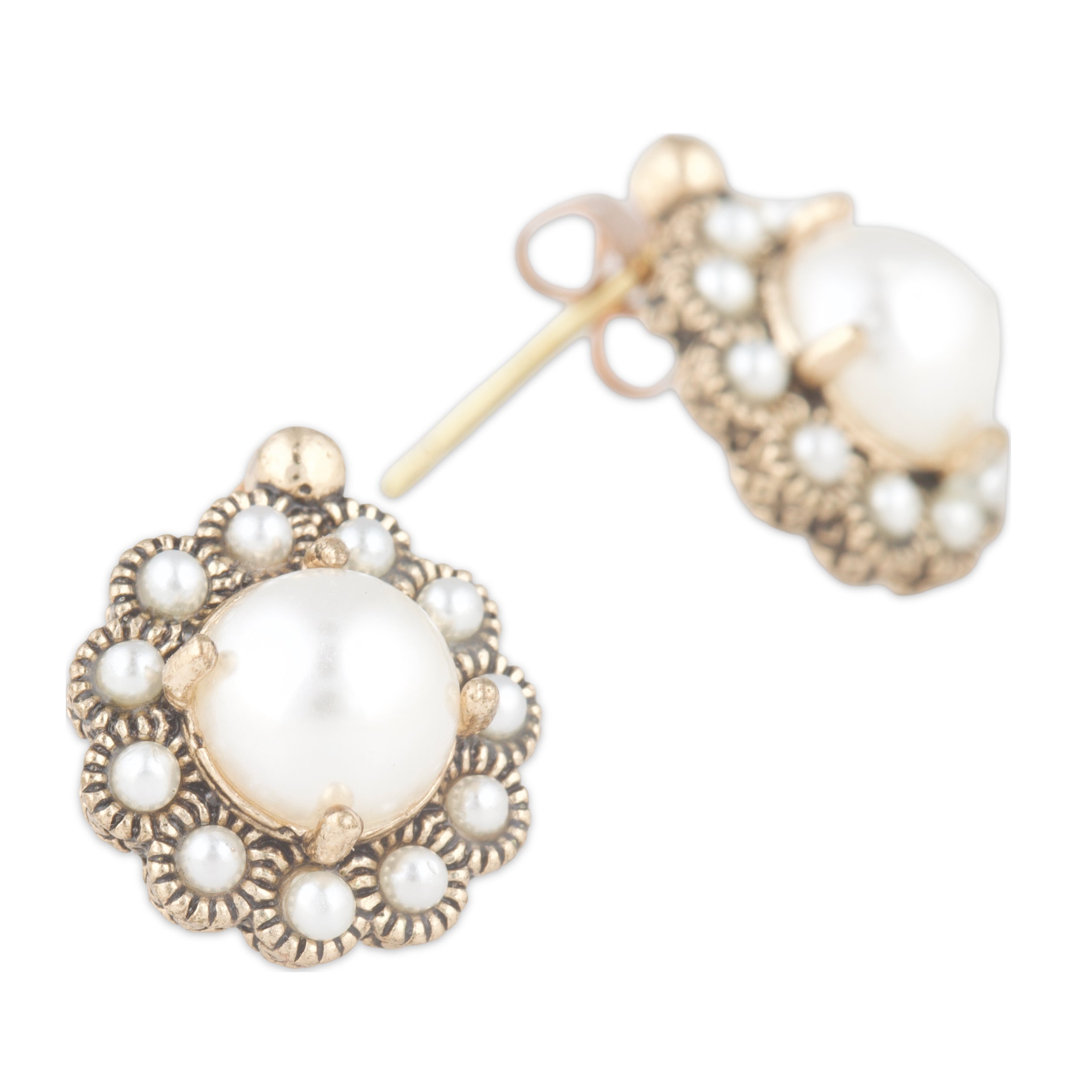 Pearl earrings with gold accents on a white background