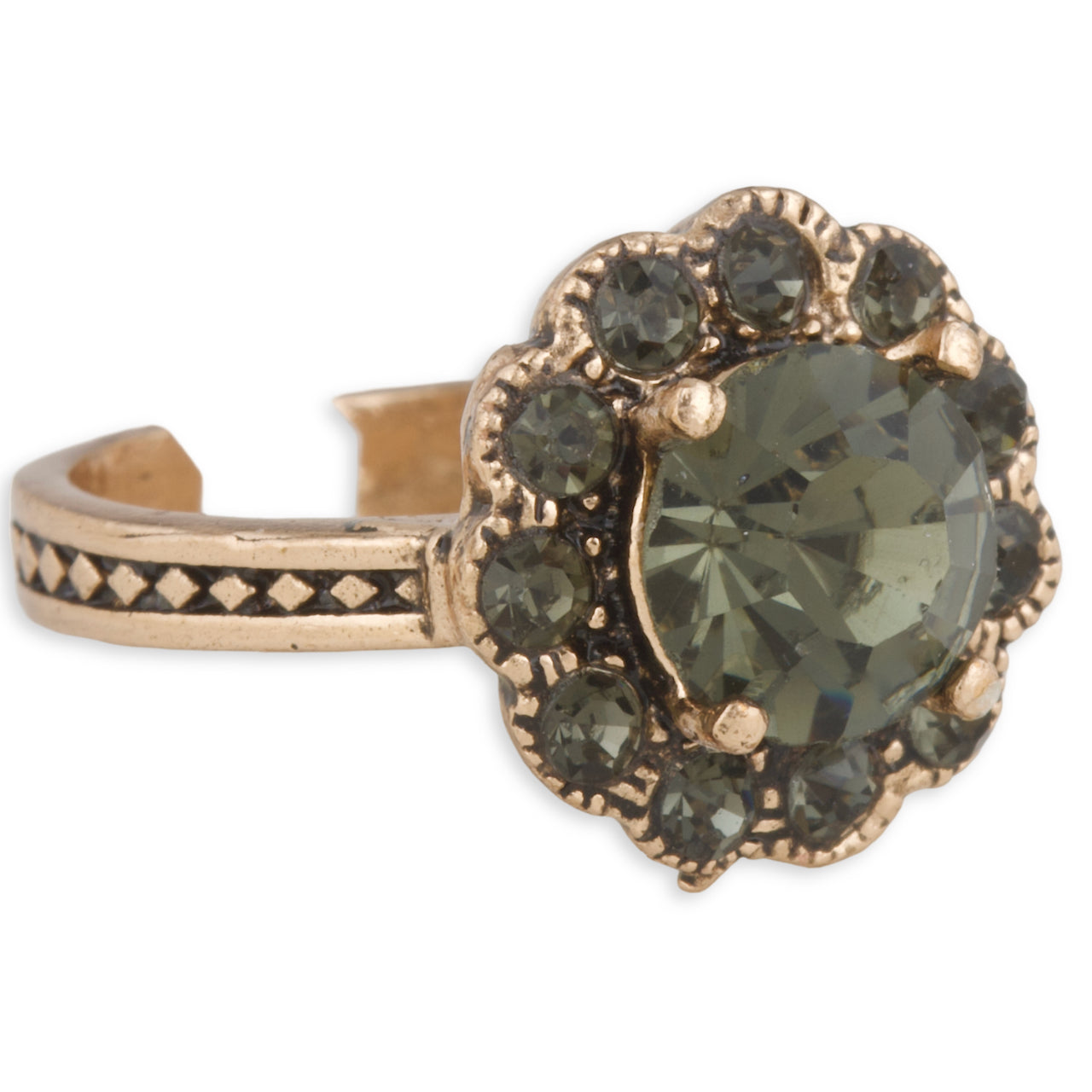 Gold ring with a heart-shaped green gemstone on a white background