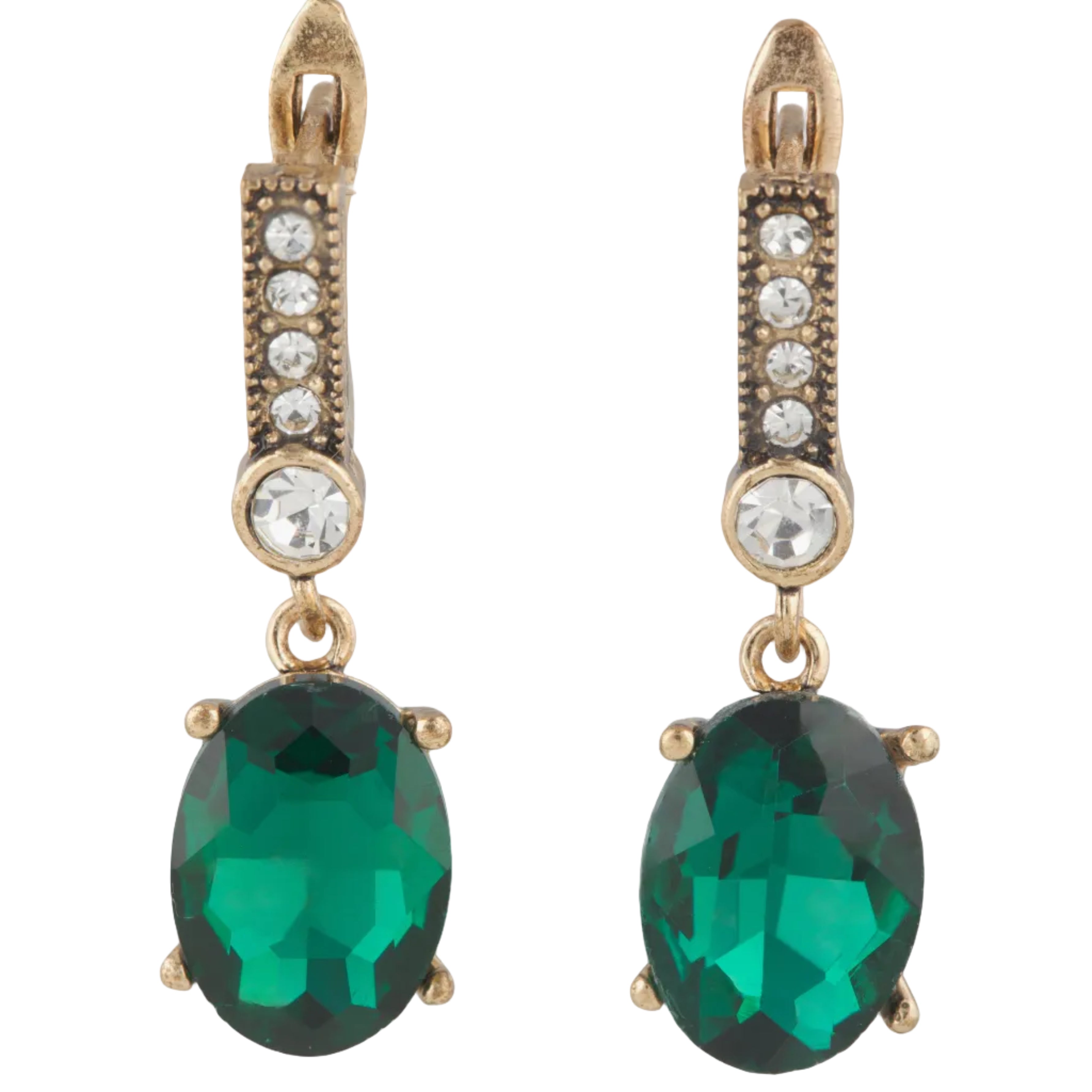 Gold earrings with green gemstones on a white background