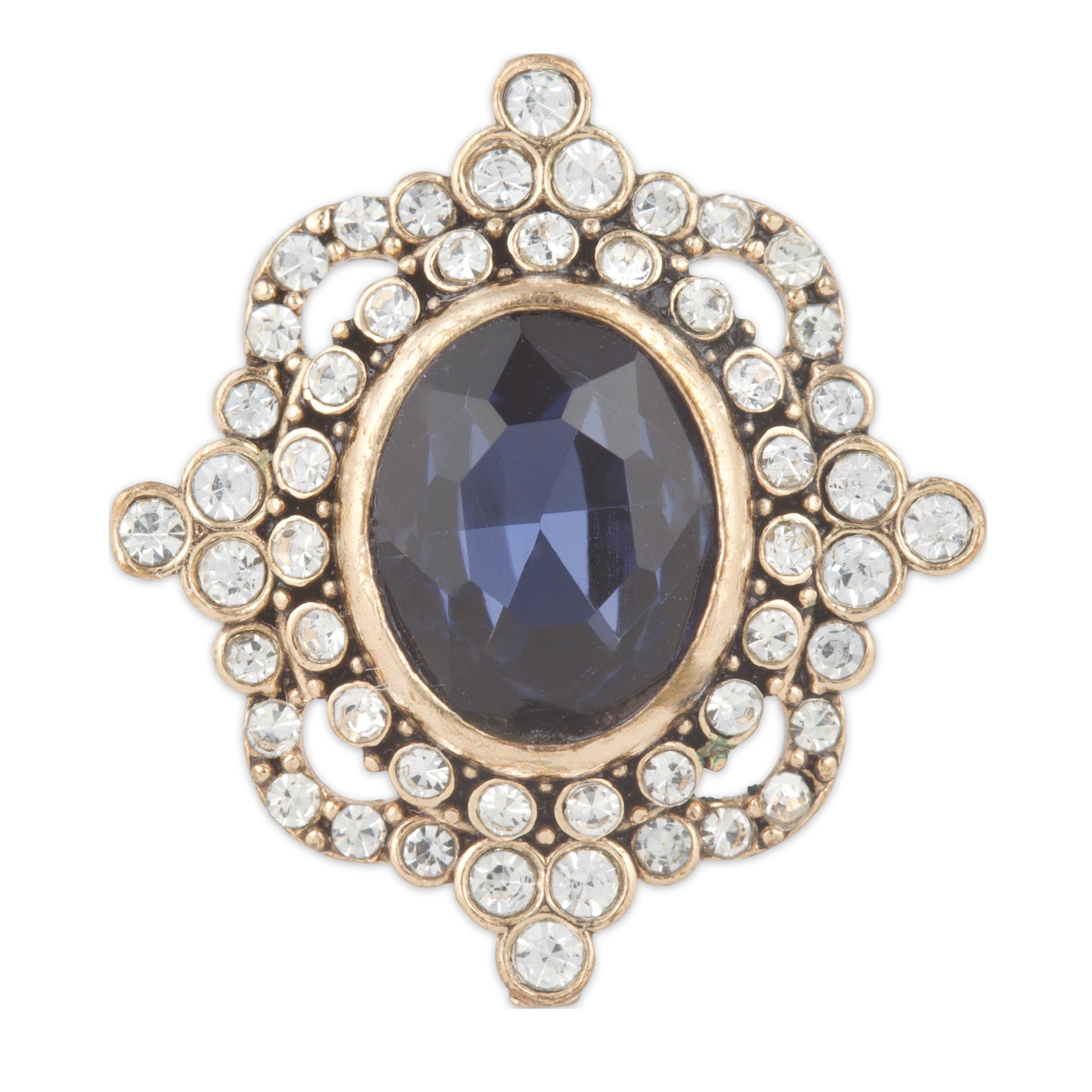 Jewelry item with blue gemstone and gold frame on a white background