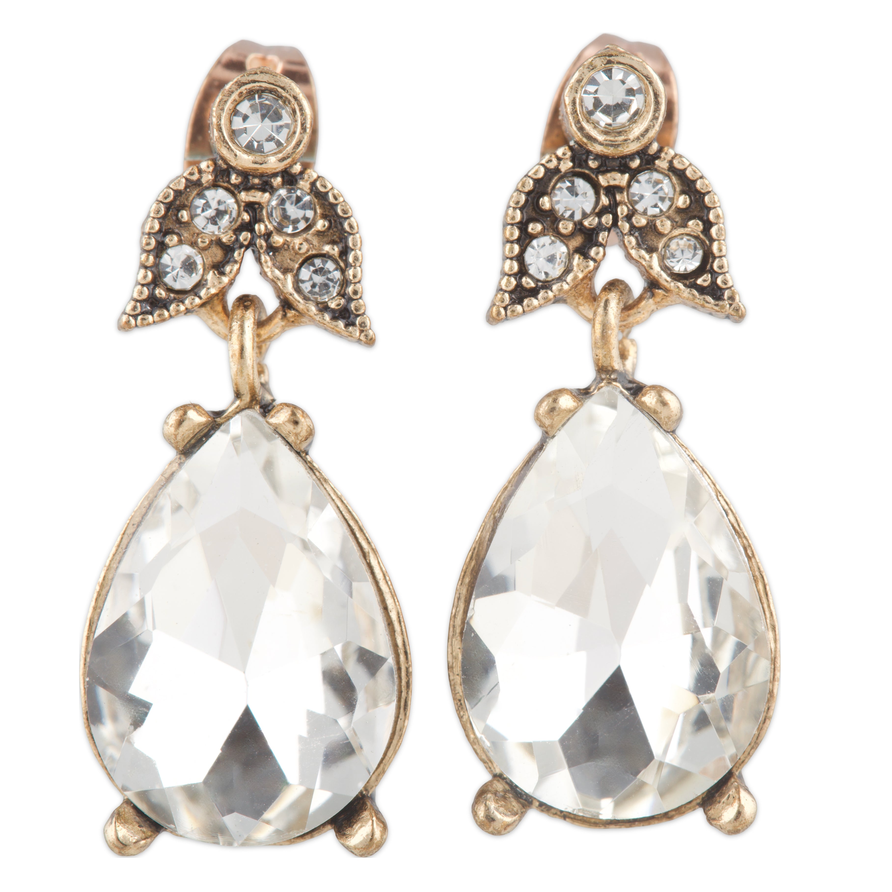 Pair of gold earrings with clear gemstones on a white background