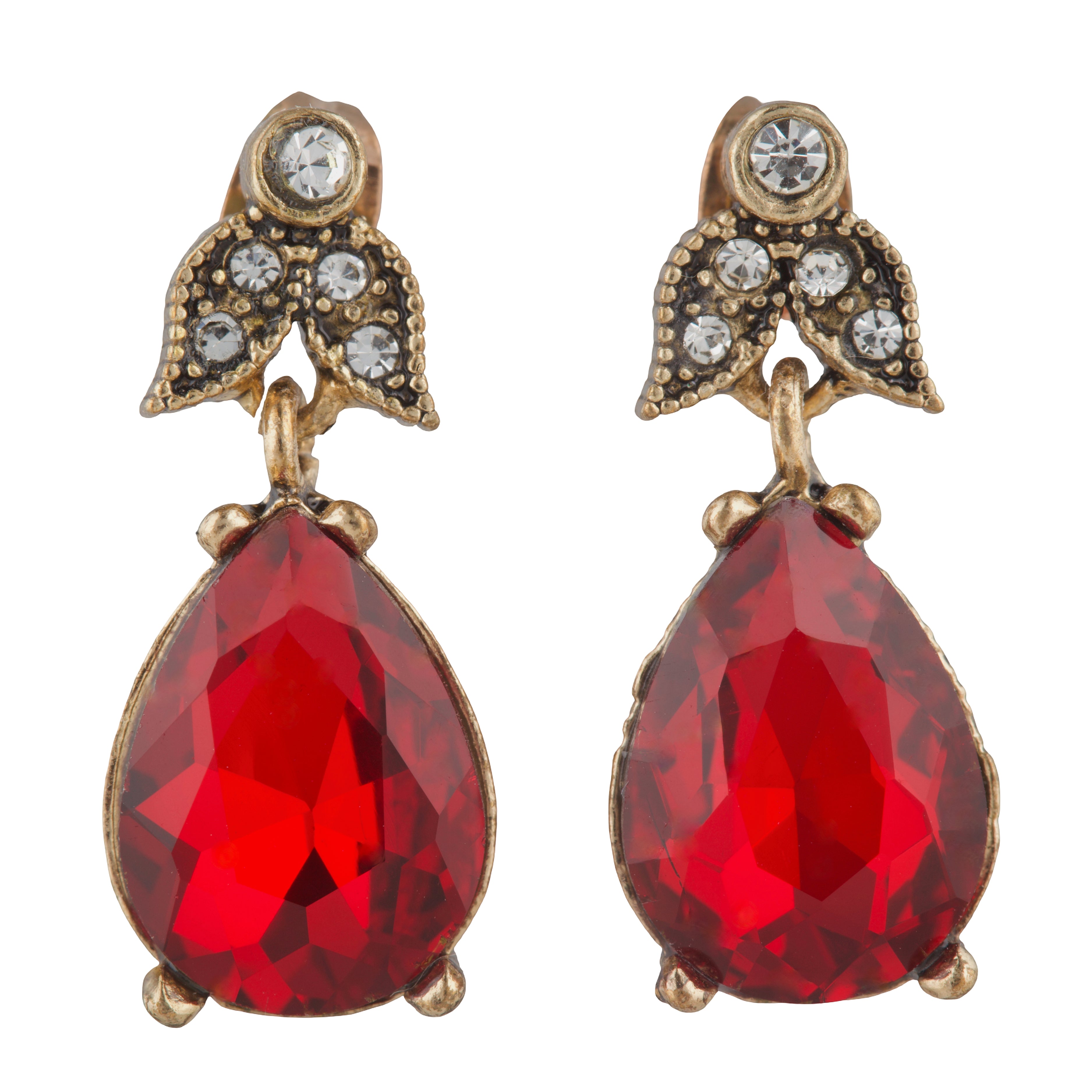 Pair of earrings with red teardrop stones and gold and crystal accents on a white background