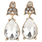 Gold earrings with clear teardrop-shaped gemstones on a white background