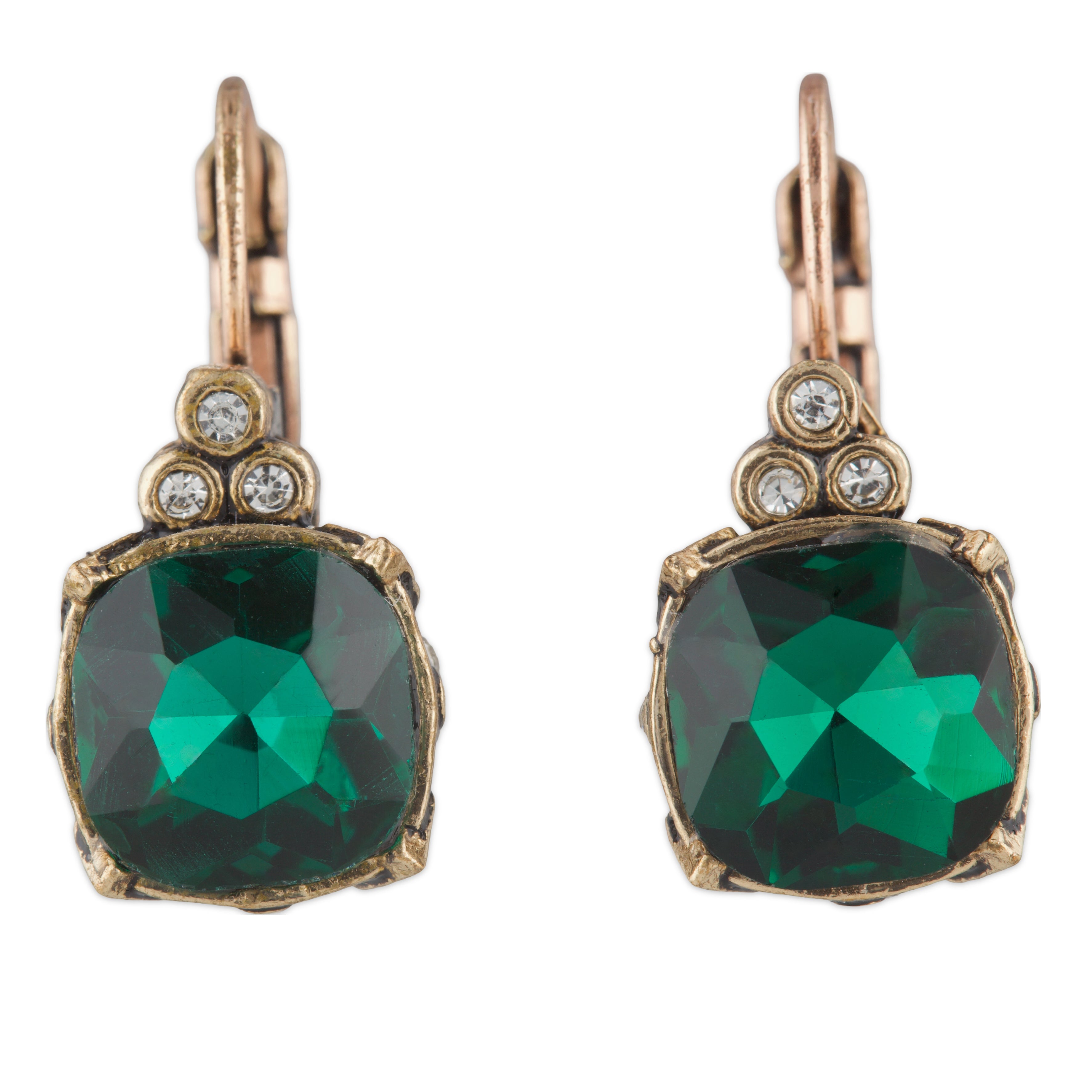 Pair of earrings with green gemstones and gold accents on a white background